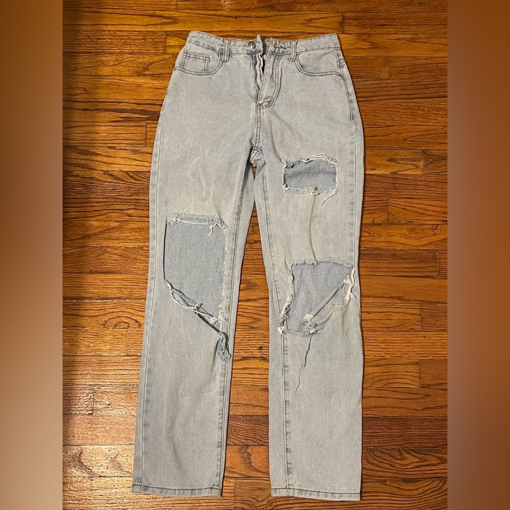 Small ripped jeans hardly worn